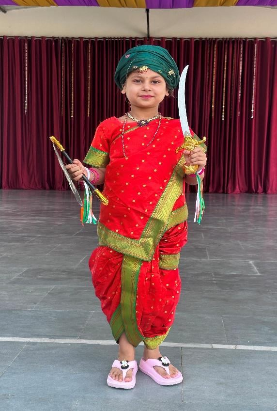 A kindergarten student at the fancy dress competition