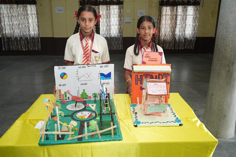 Students with their science models