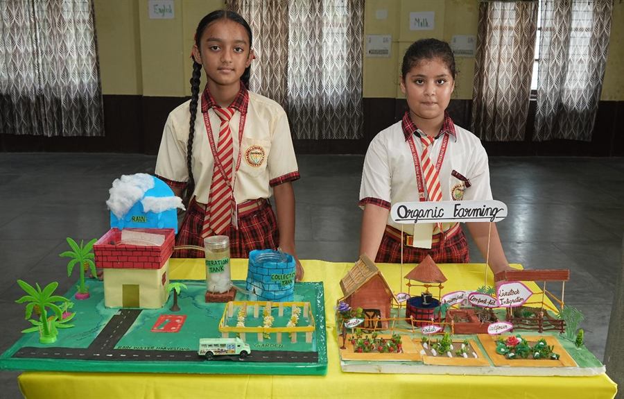 Students presenting models at the science exhibition