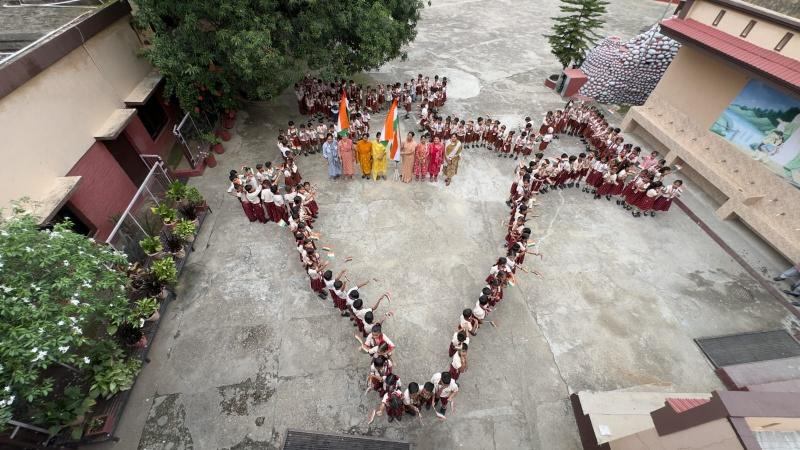 Students forming the map of India in the courtyard