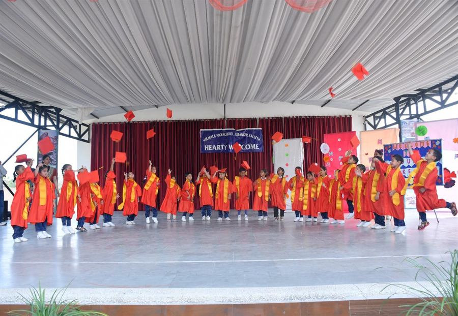 Kindergarten students performing on stage