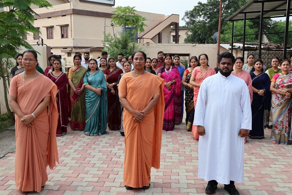 Sisters, clergy and staff of Nirmala High School
